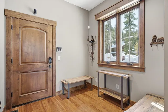 a view of a livingroom with furniture and a window