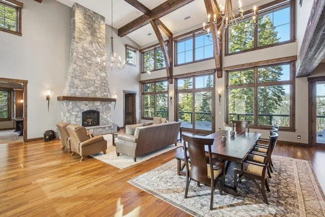 a view of a livingroom with furniture window and wooden floor