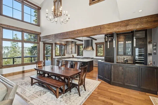 a balcony with furniture and wooden floor