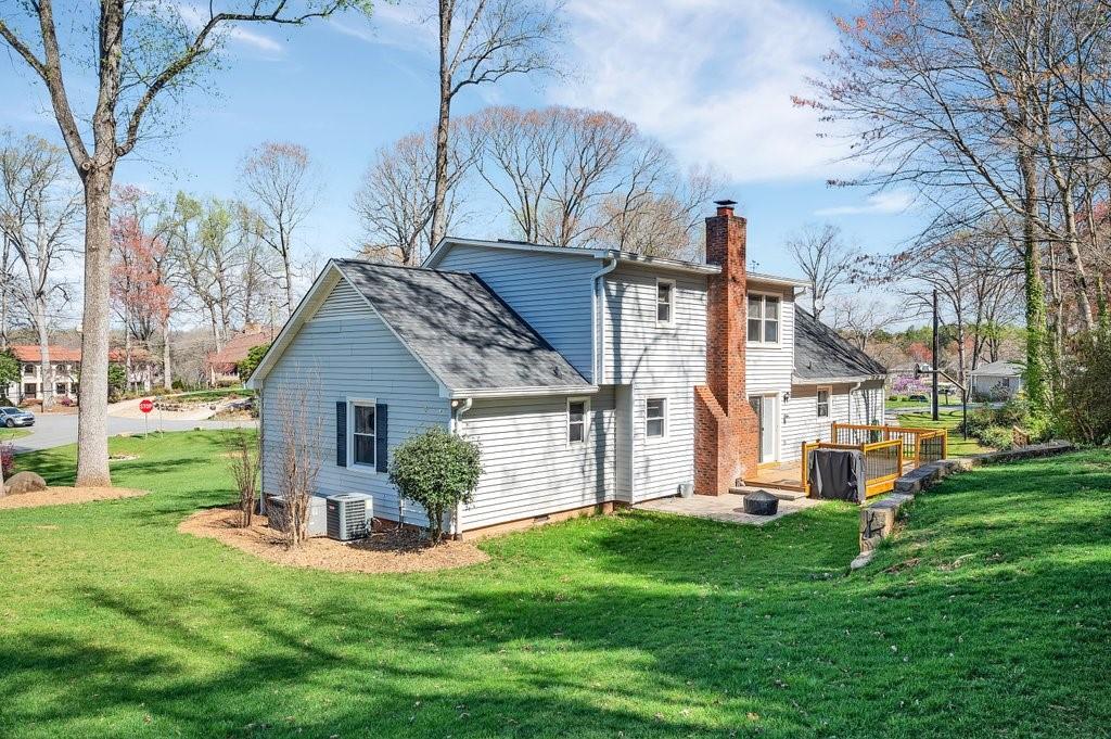 4655 Lake Shore Road North Denver, NC 28037 - Photo 2 of 31 a view of a house with a yard and sitting area