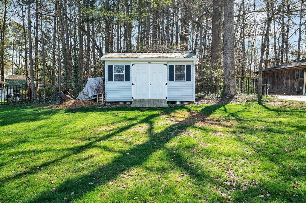 4655 Lake Shore Road North Denver, NC 28037 - Photo 7 of 31 a view of a house with a yard and sitting area