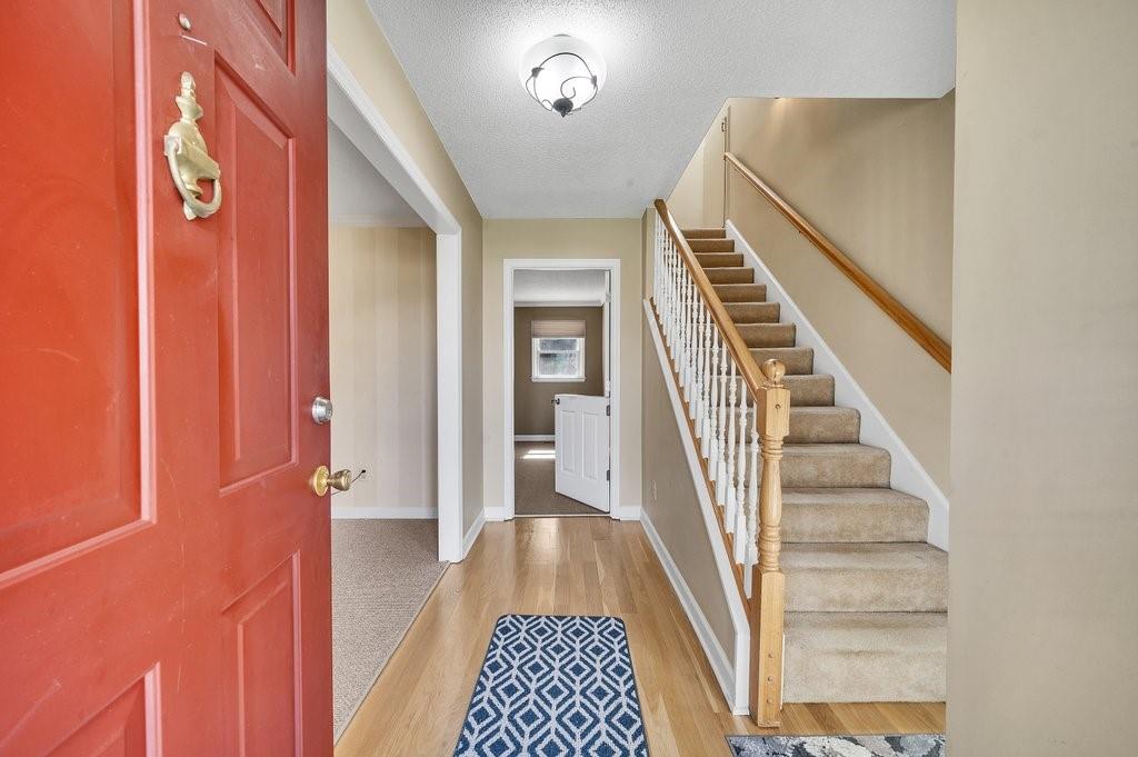 4655 Lake Shore Road North Denver, NC 28037 - Photo 9 of 31 a view of a hallway with wooden floor and entryway