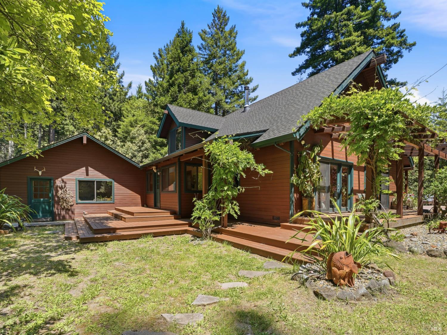 31397 Seaview Road Cazadero, CA 95421 - Photo 36 of 47 a view of a house with a yard