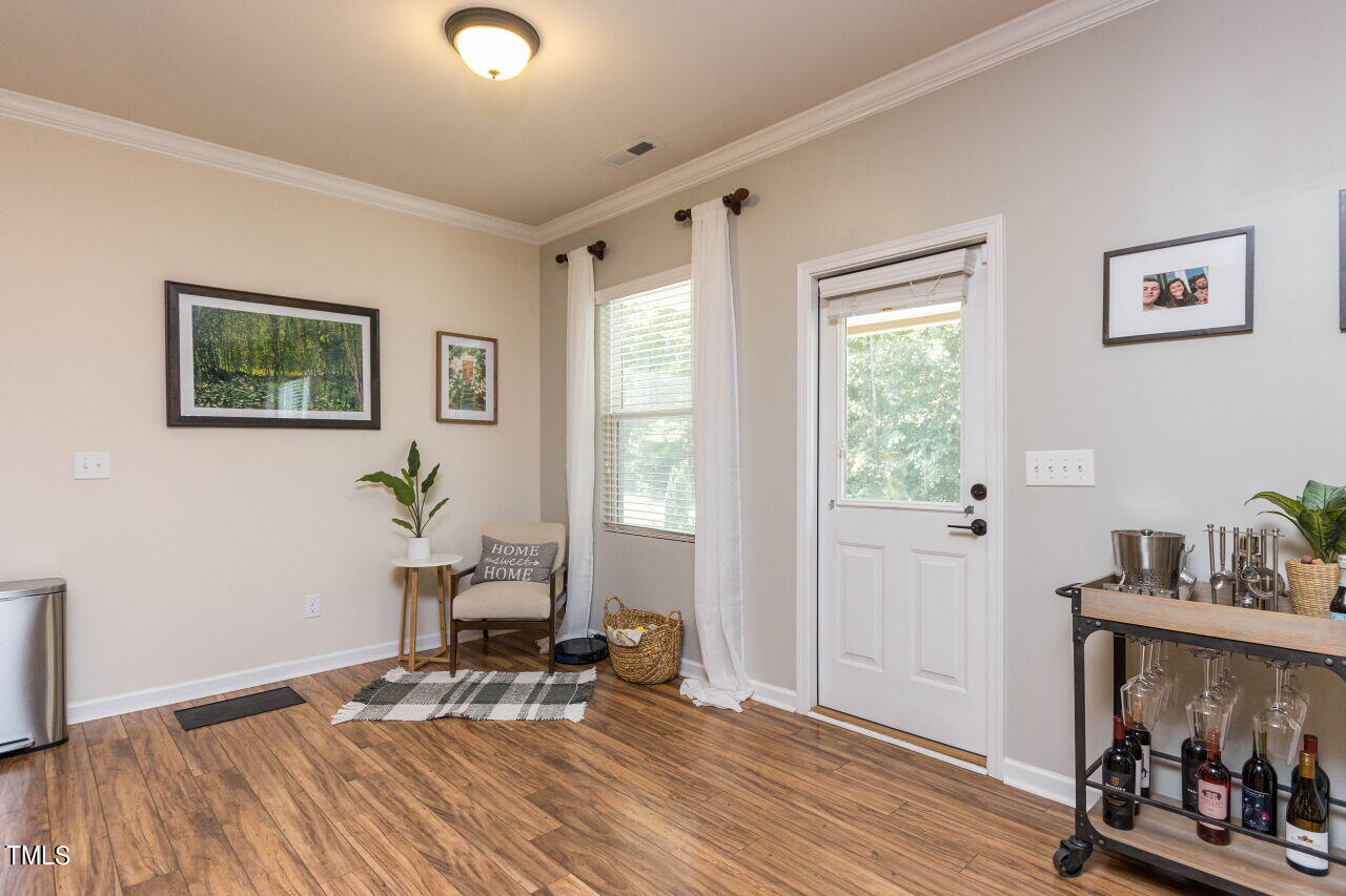 3464 Althorp Drive Raleigh, NC 27616 - Photo 9 of 32 Breakfast Area opens to the Screened in porch, patio and large flat private backyard.