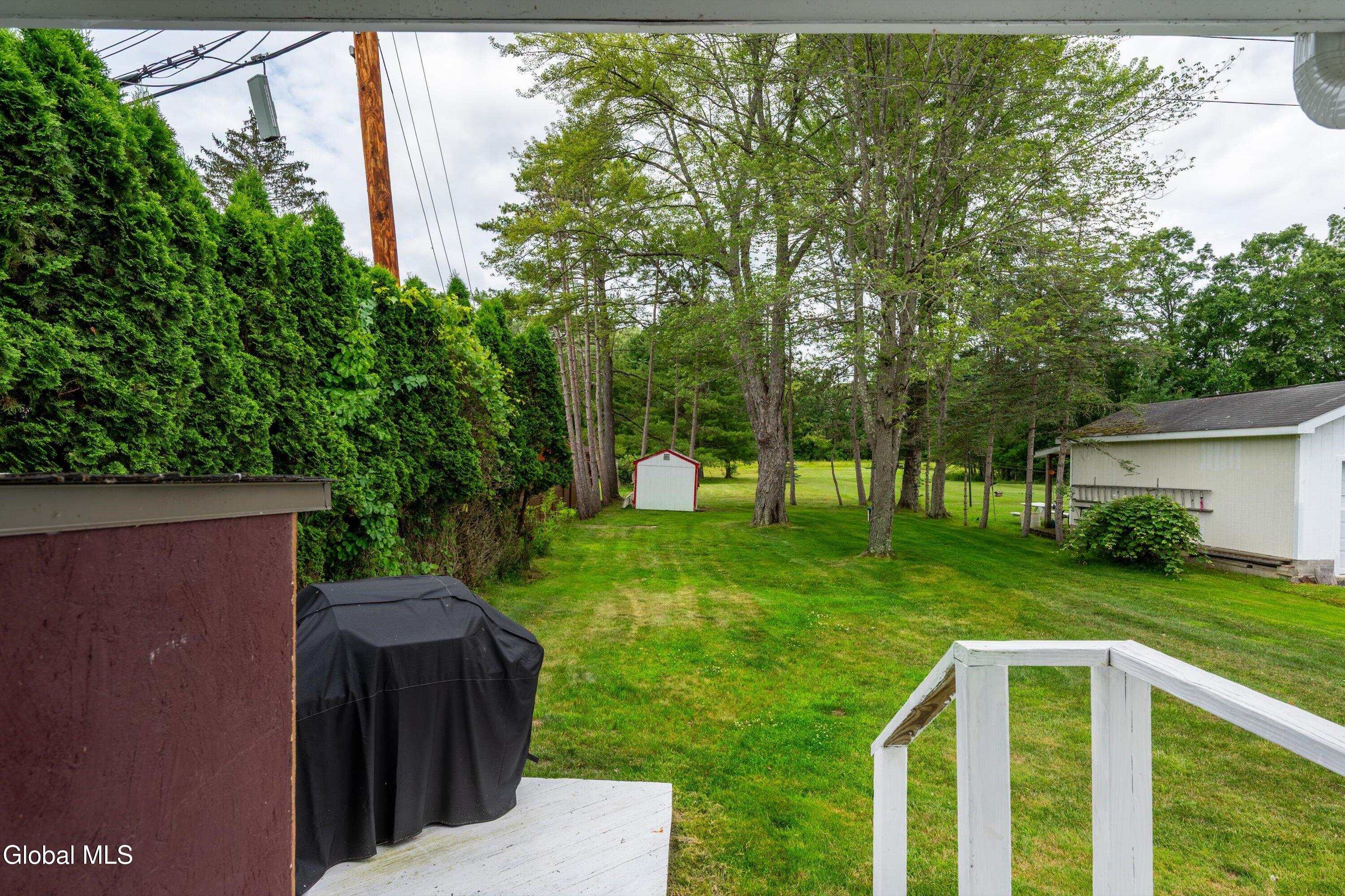 7 Kozy Lane Malta, NY 12020 - Photo 19 of 22 Backyard