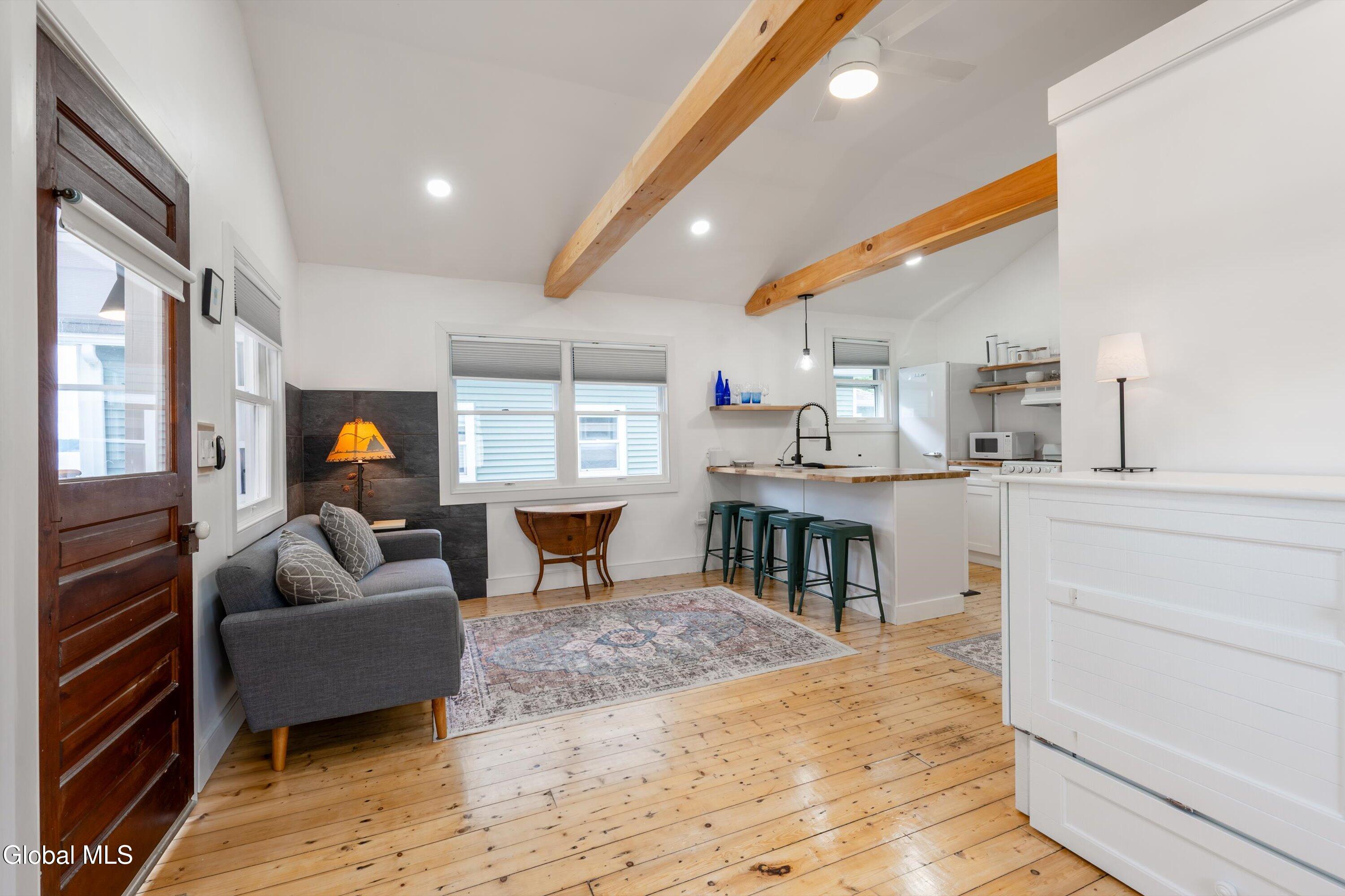 7 Kozy Lane Malta, NY 12020 - Photo 5 of 22 Kitchen to Living Room