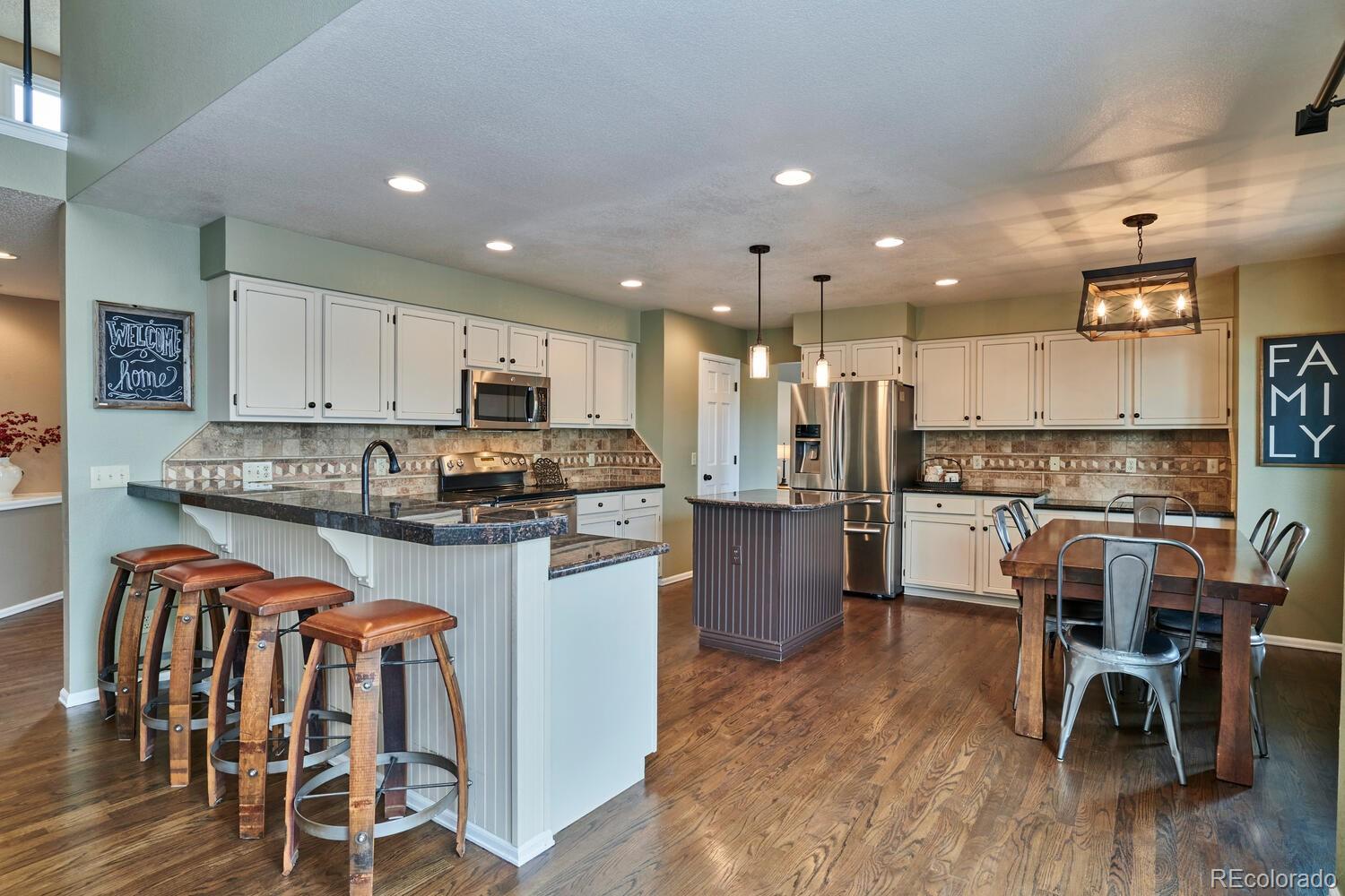 9835 Venneford Ranch Road Highlands Ranch, CO 80126 - Photo 8 of 40 Gallery Image 8