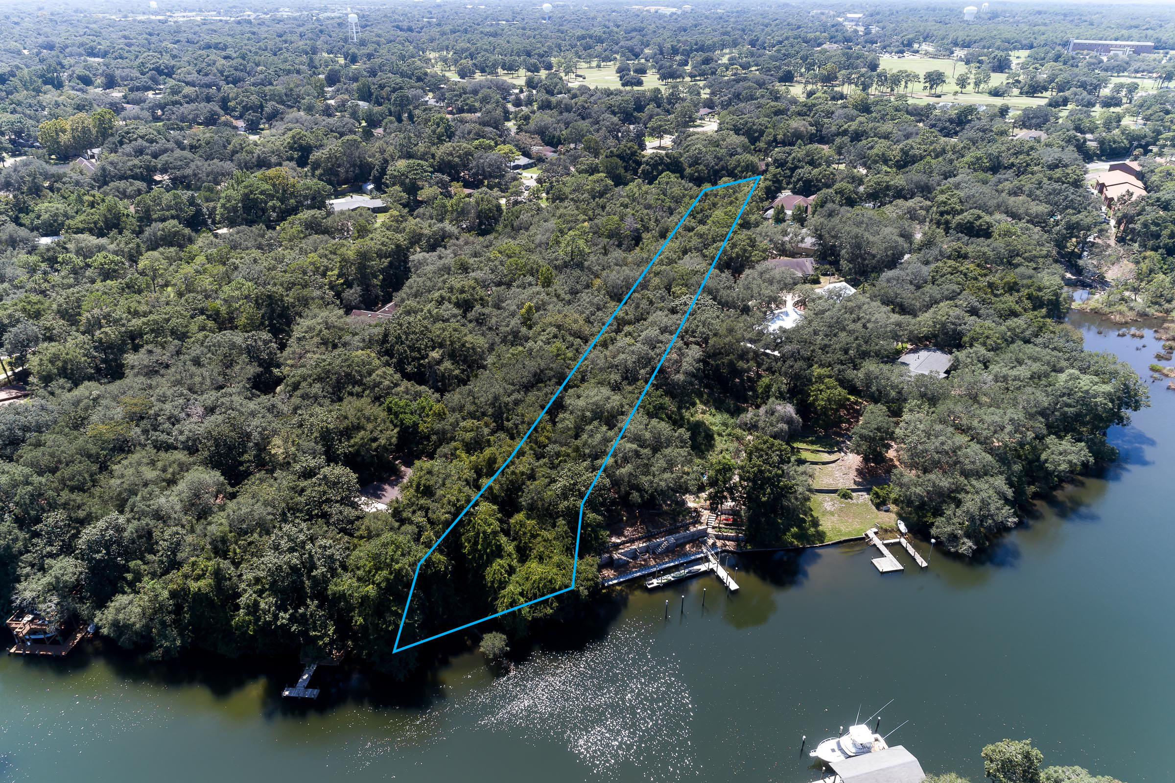 Xx Northwest Xx Nw Mooney Road Fort Walton Beach, FL 32547 - Photo 1 of 26 an aerial view of a houses with a yard