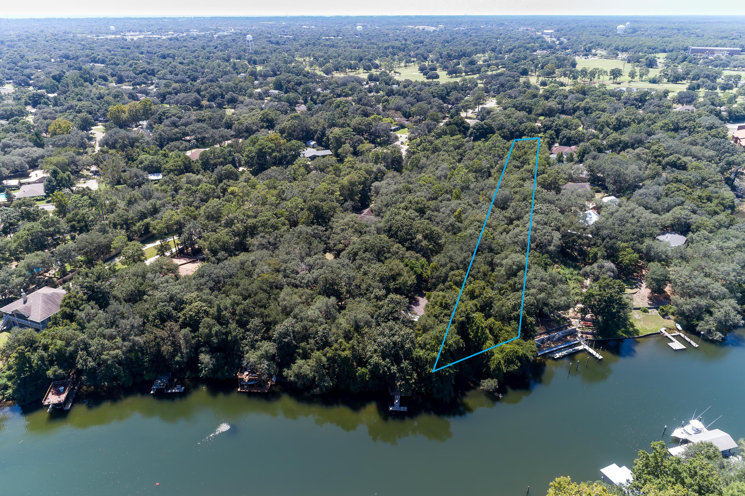 Xx Northwest Xx Nw Mooney Road Fort Walton Beach, FL 32547 - Photo 4 of 26 an aerial view of a houses with city view and lake view