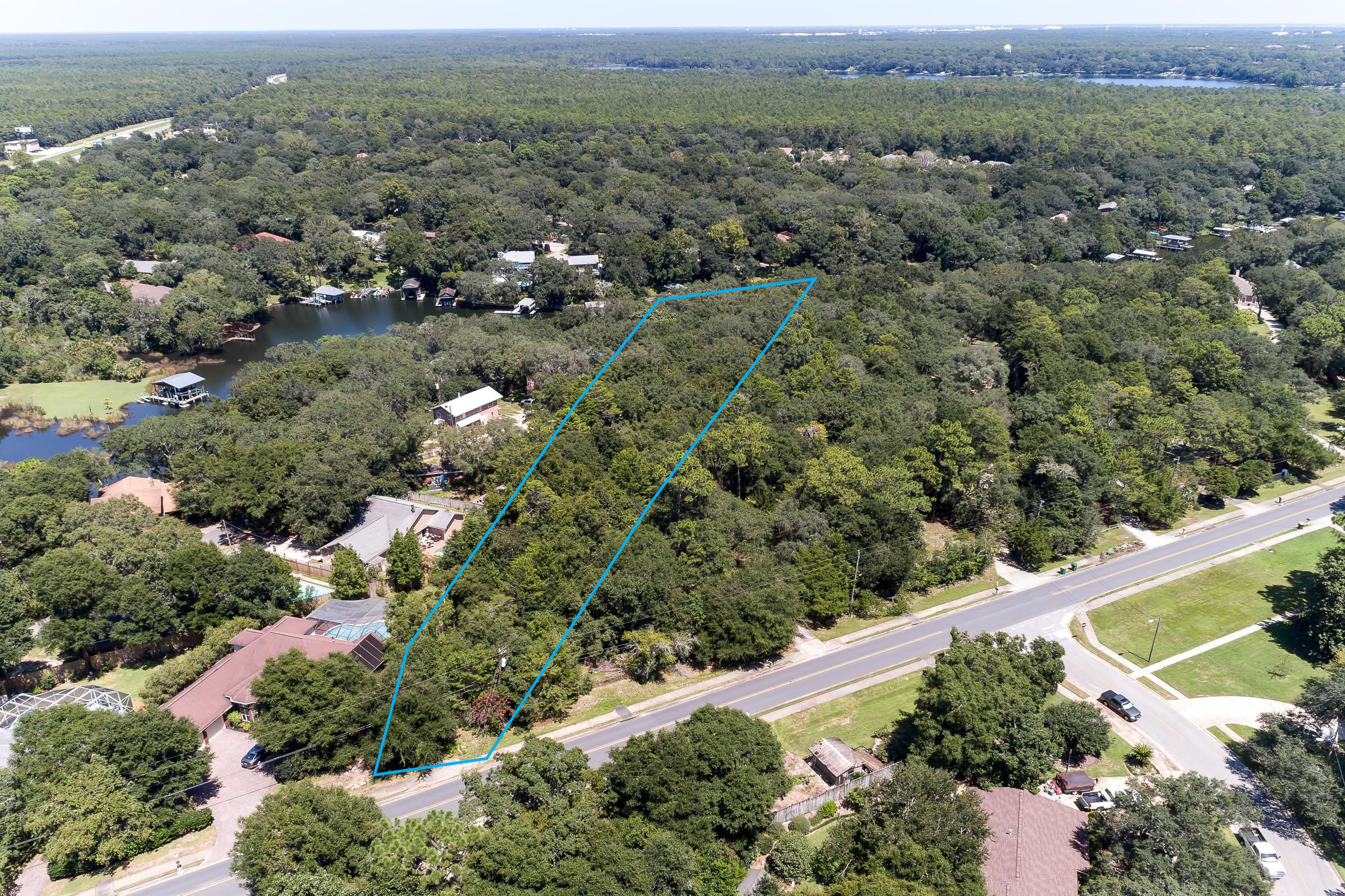 Xx Northwest Xx Nw Mooney Road Fort Walton Beach, FL 32547 - Photo 8 of 26 an aerial view of a town with couple of houses