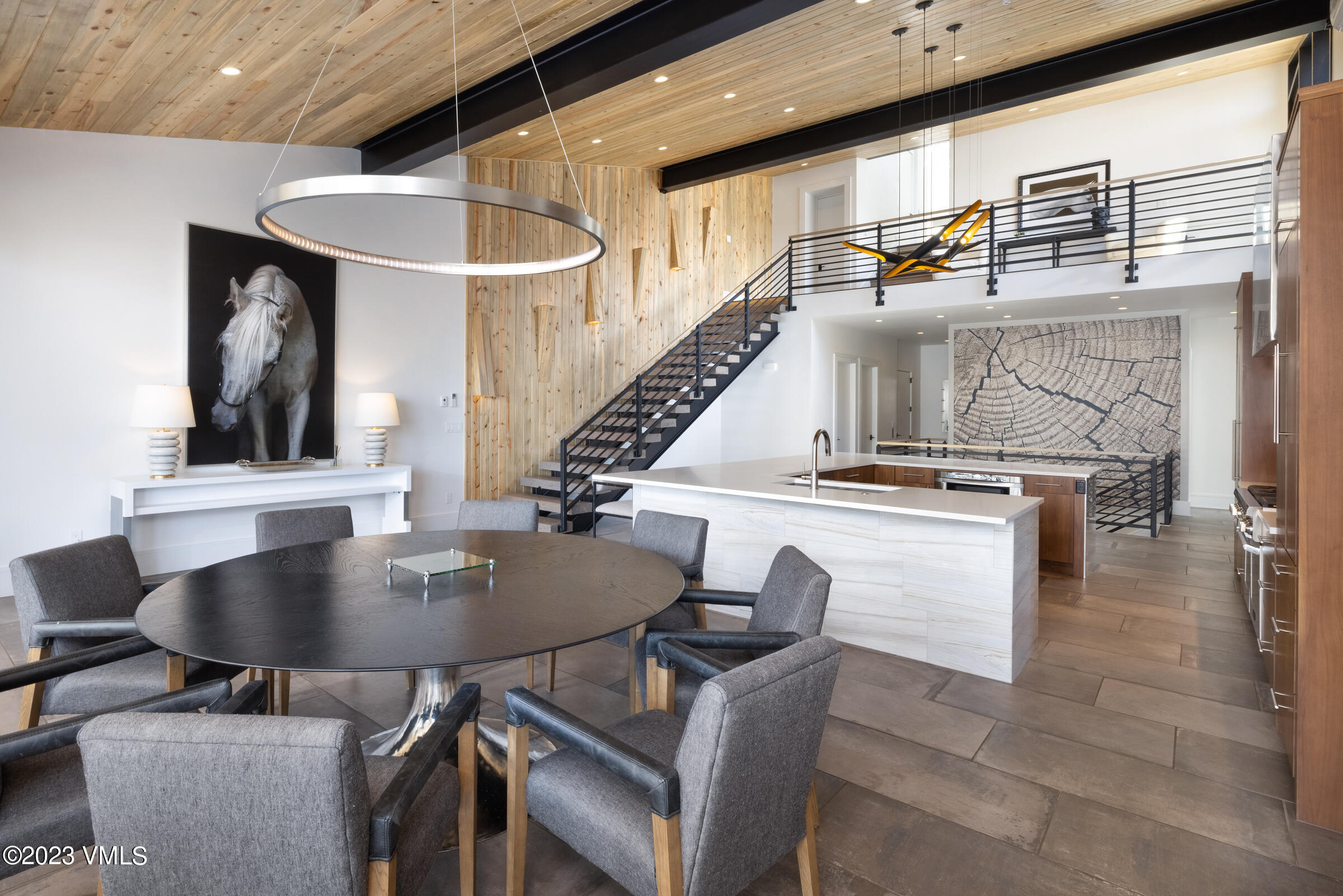 2350 Sequoia Drive Vail, CO 81657 - Photo 4 of 10 a dining room with furniture and wooden floor