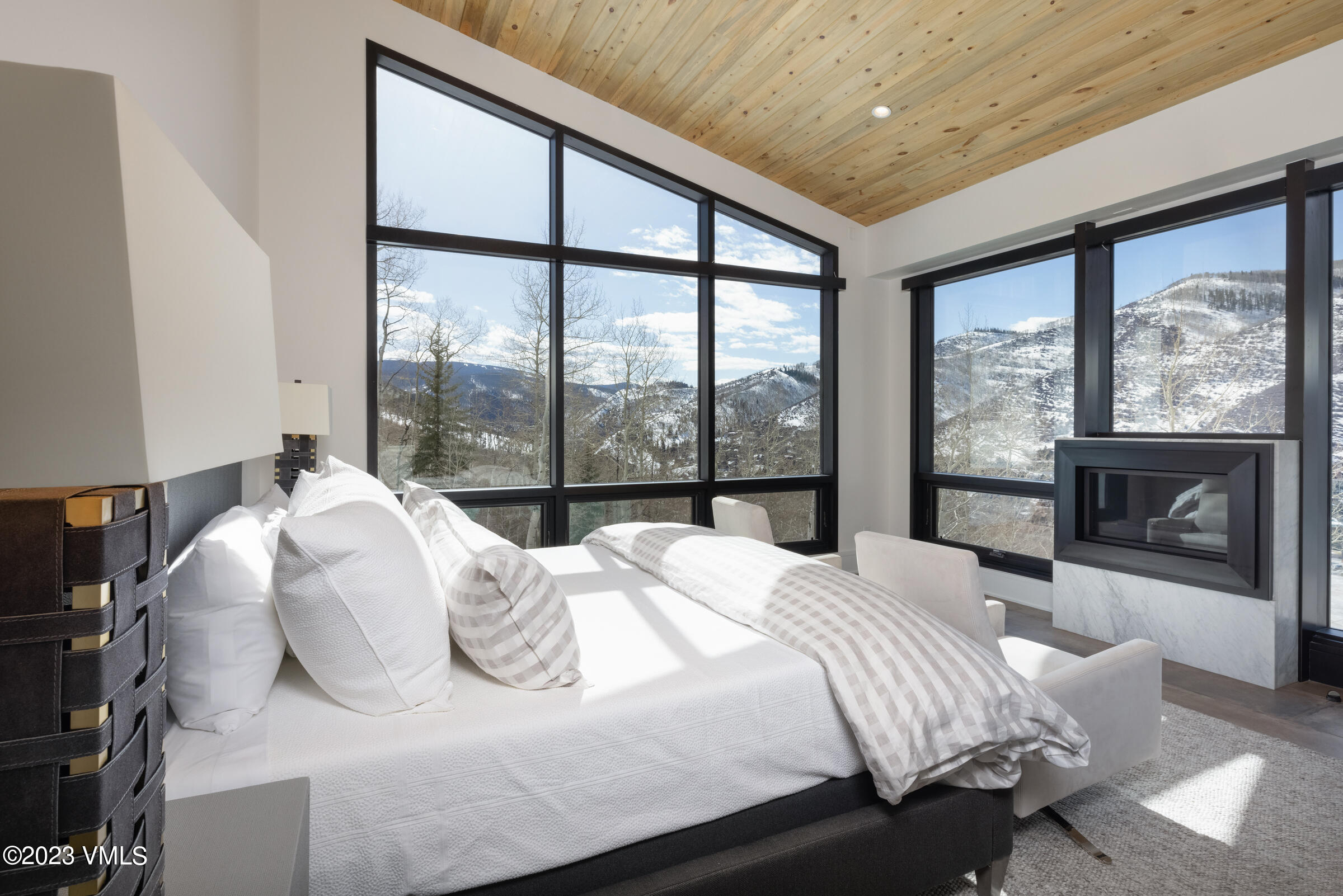 2350 Sequoia Drive Vail, CO 81657 - Photo 5 of 10 a bedroom with a bed and a large window