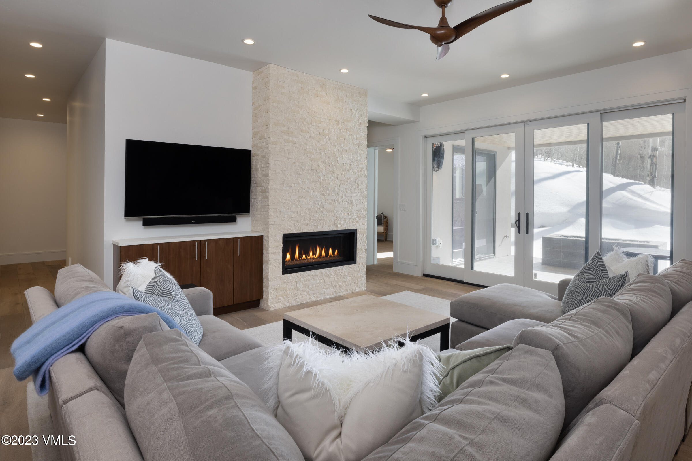 2350 Sequoia Drive Vail, CO 81657 - Photo 6 of 10 a living room with furniture and a flat screen tv
