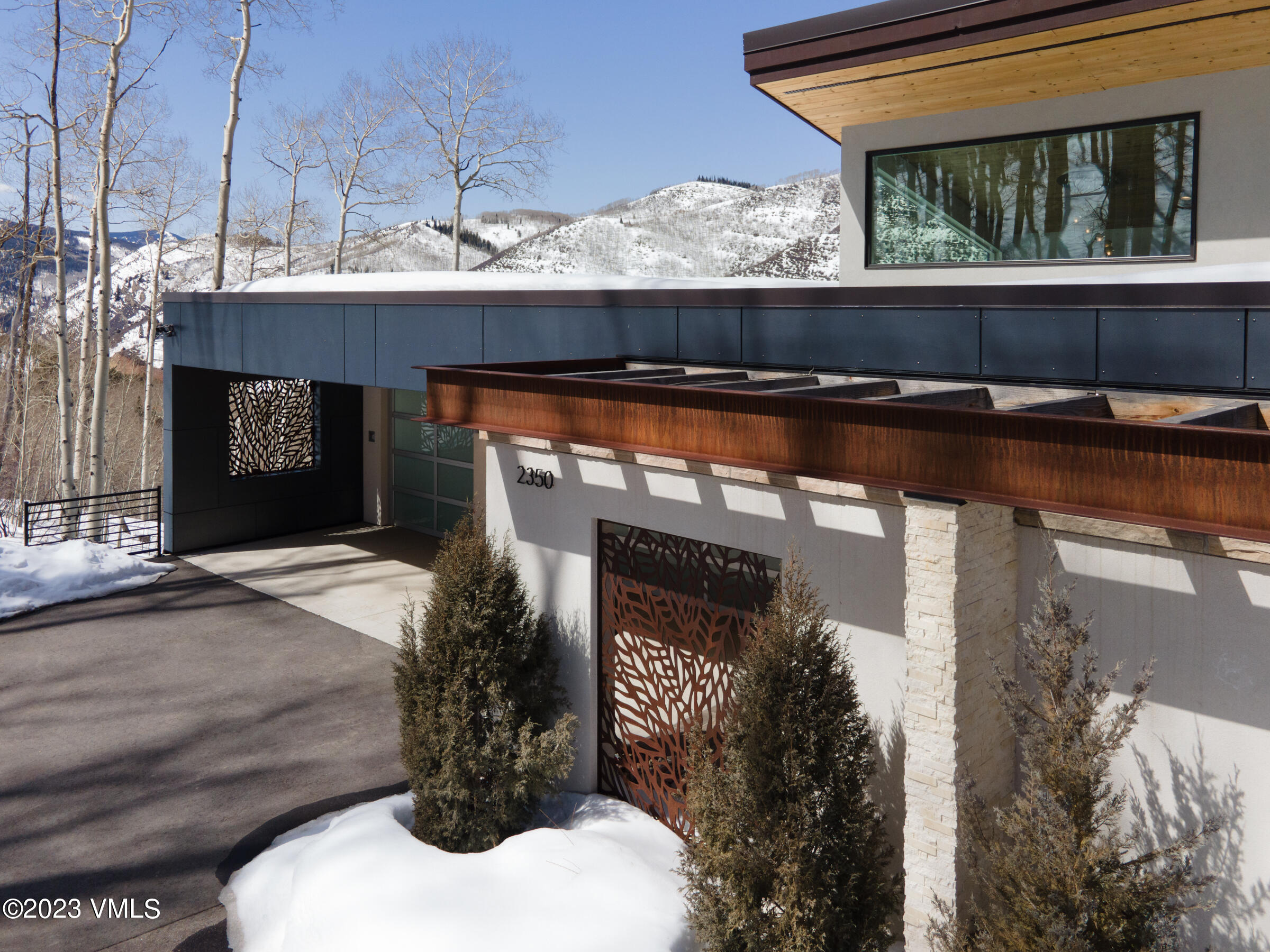 2350 Sequoia Drive Vail, CO 81657 - Photo 10 of 10 a front view of a house with a yard