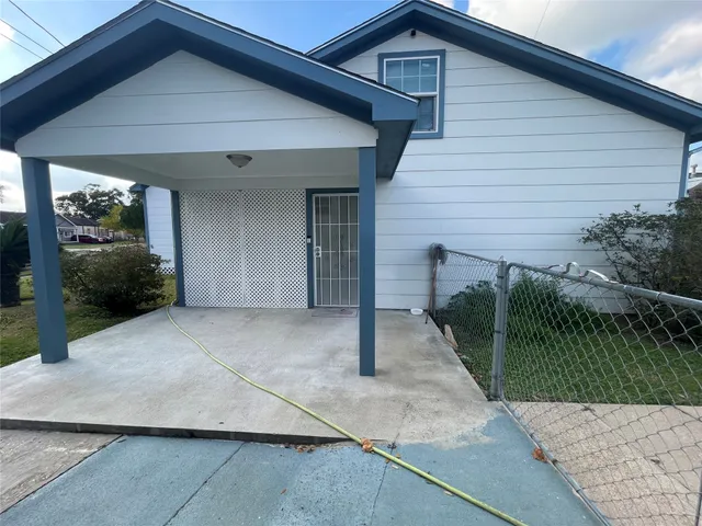 a front view of a house with parking space