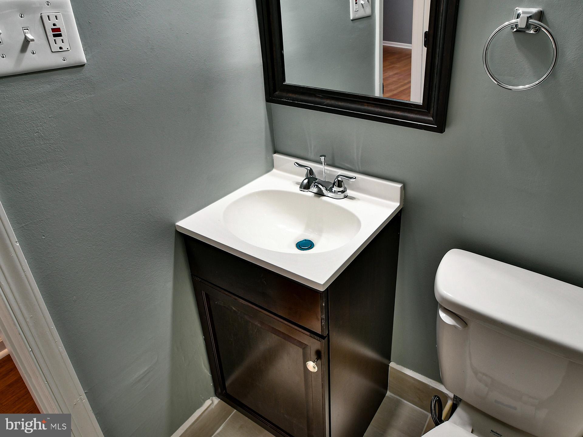 6308 Larwin Drive, Unit (MAIN LEVEL) Temple Hills, MD 20748 - Photo 22 of 30 Hallway Bath