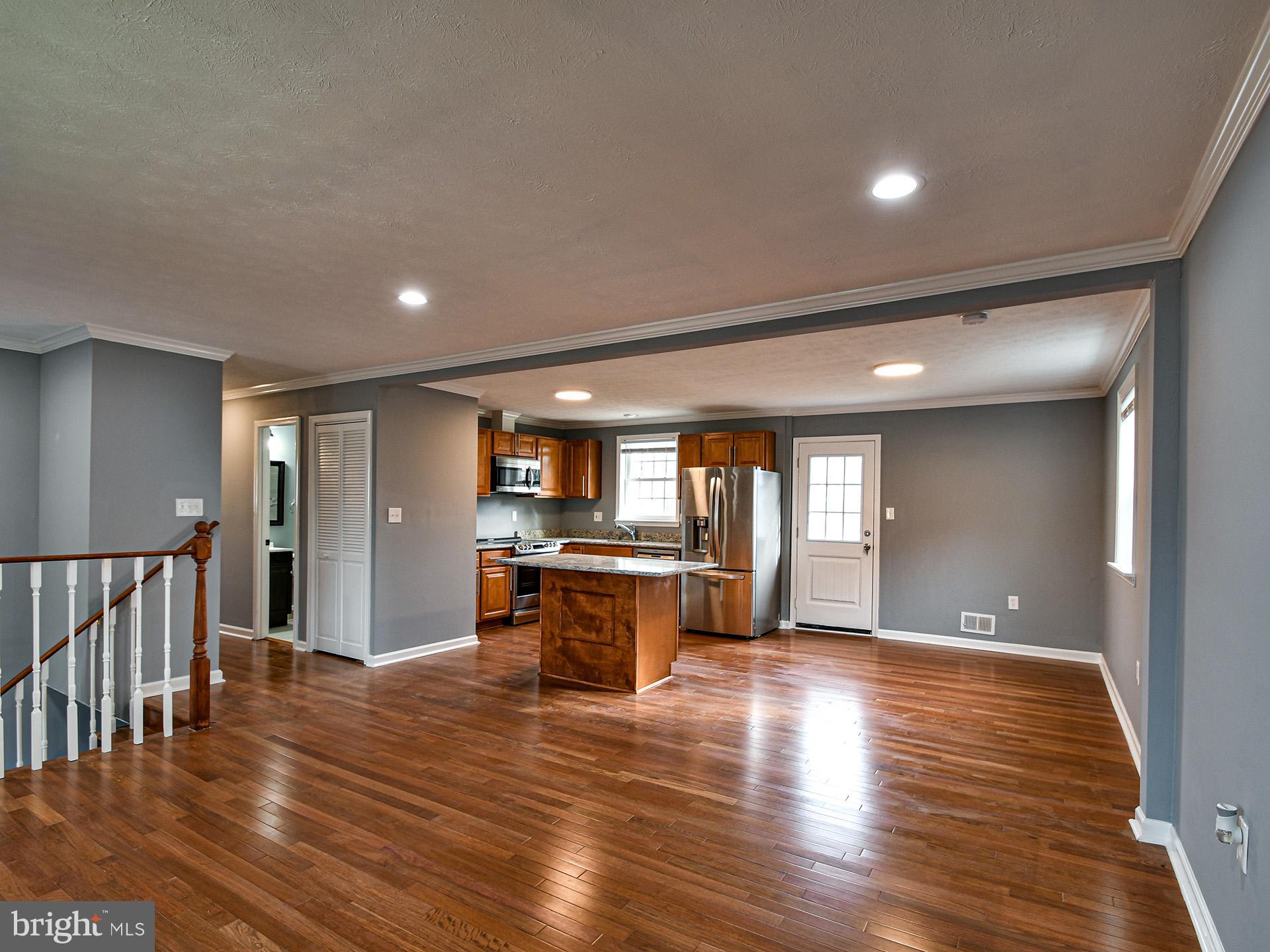 6308 Larwin Drive, Unit (MAIN LEVEL) Temple Hills, MD 20748 - Photo 6 of 30 LR, Dining, Kitchen view