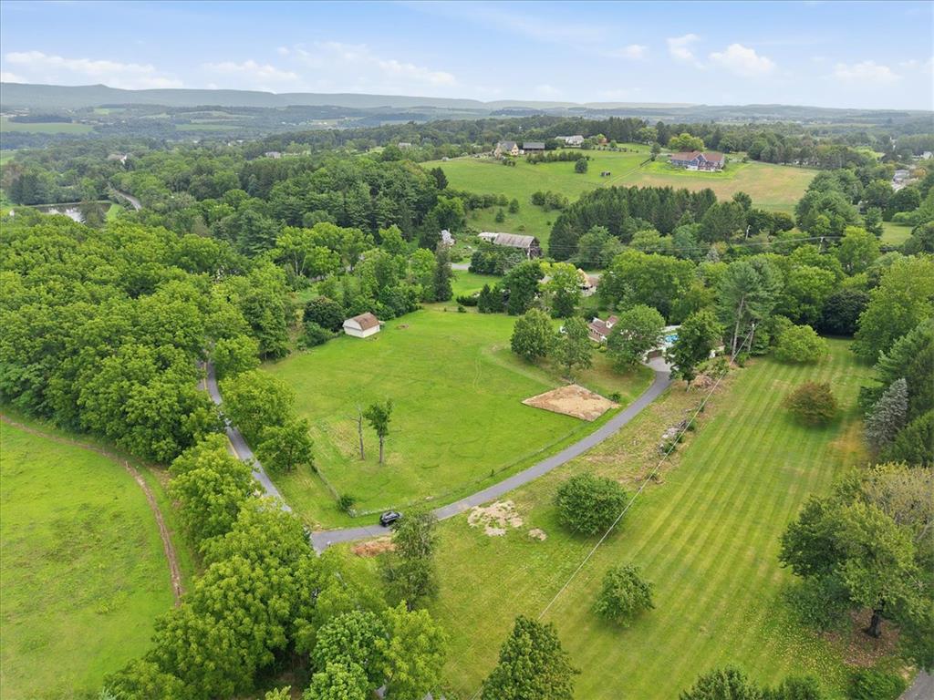 7722 Sechler Road New Tripoli, PA 18066 - Photo 56 of 58 Lush rolling hills and mature woodlands frame this expansive countryside property view.