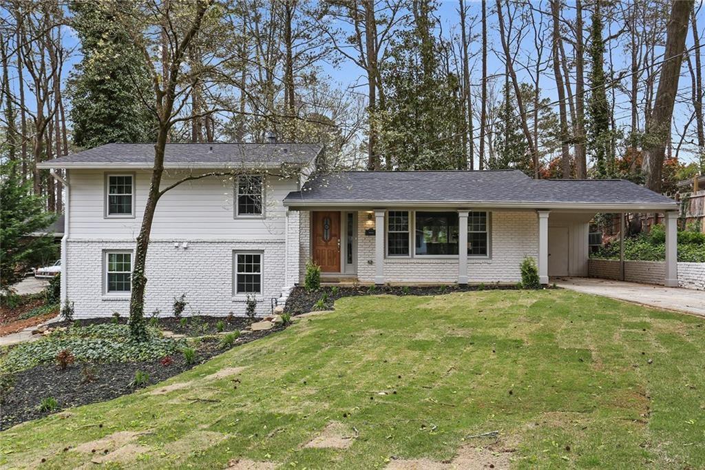 3650 Fortingale Road Chamblee, GA 30341 - Photo 1 of 1 a view of a yard in front of a house with large tree