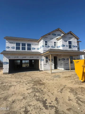 a view of a house with a swimming pool