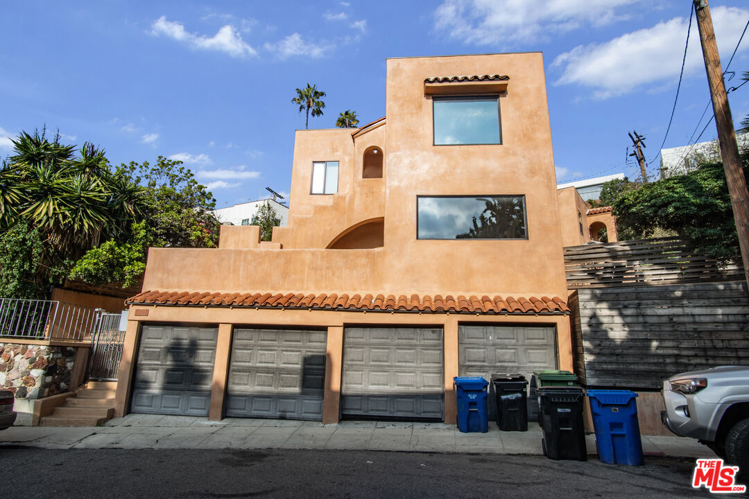3361 Hamilton Way Los Angeles, CA 90026 - Photo 1 of 25 a front view of a house with parking