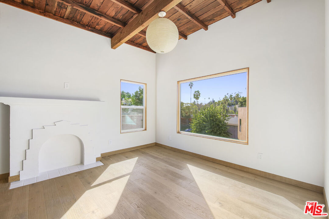 3361 Hamilton Way Los Angeles, CA 90026 - Photo 22 of 25 a view of empty room with window and ceiling fan