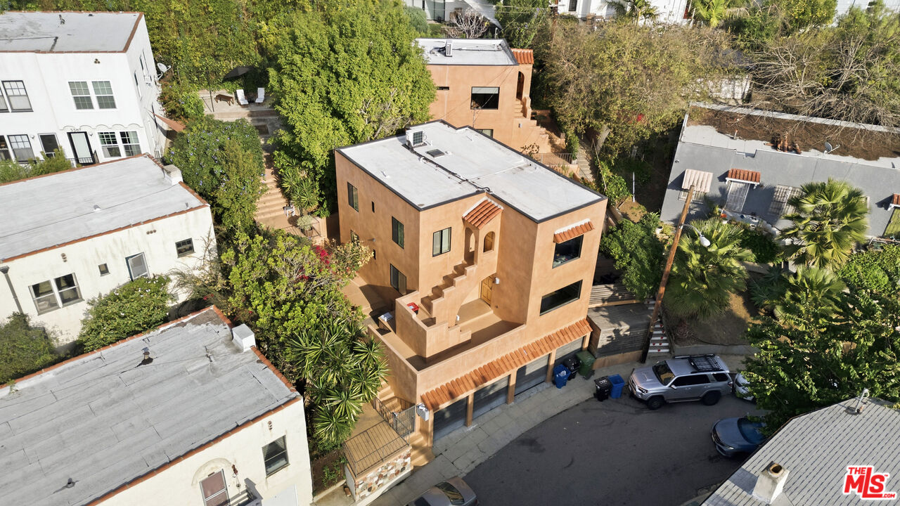 3361 Hamilton Way Los Angeles, CA 90026 - Photo 5 of 25 an aerial view of a house with a yard and parking spaces