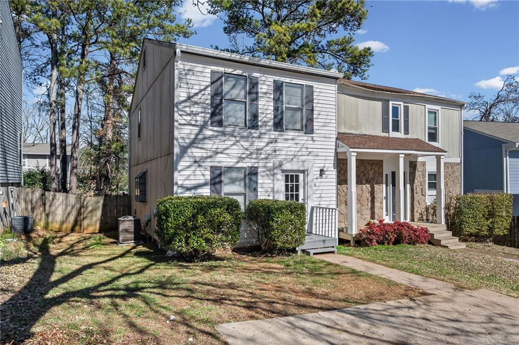 1222 Ridgecrest Lane Southeast Smyrna, GA 30080 - Photo 2 of 27 front view of a house with a yard