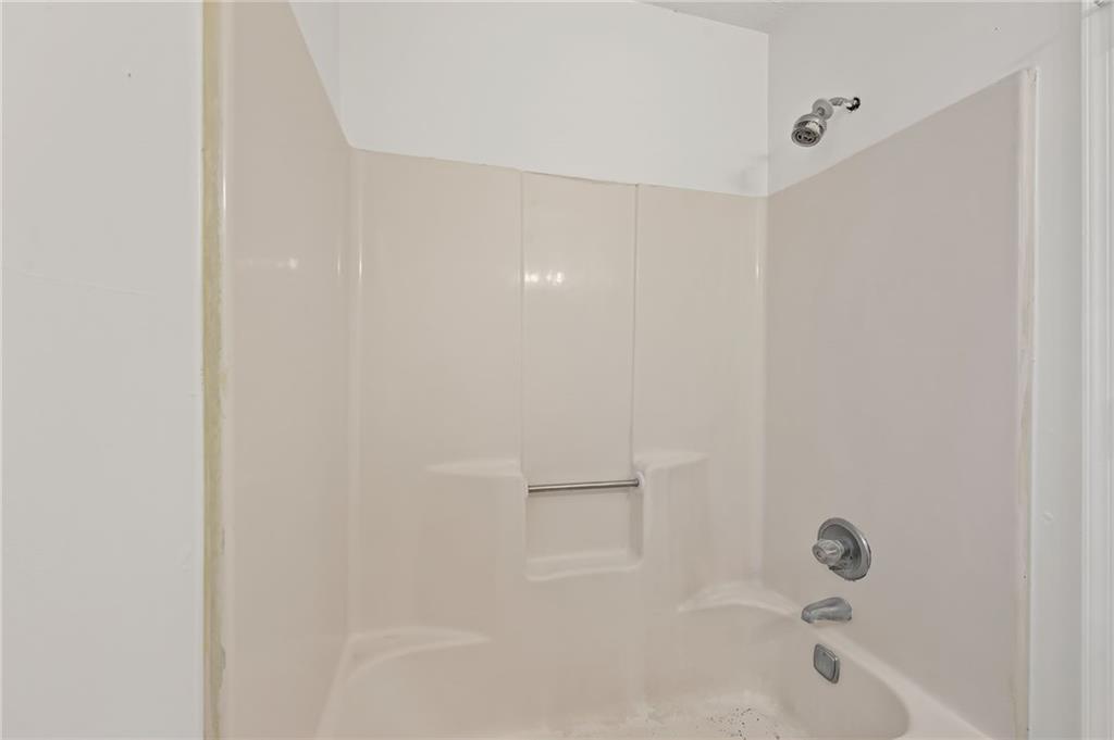 1222 Ridgecrest Lane Southeast Smyrna, GA 30080 - Photo 27 of 27 a bathroom with a bathtub