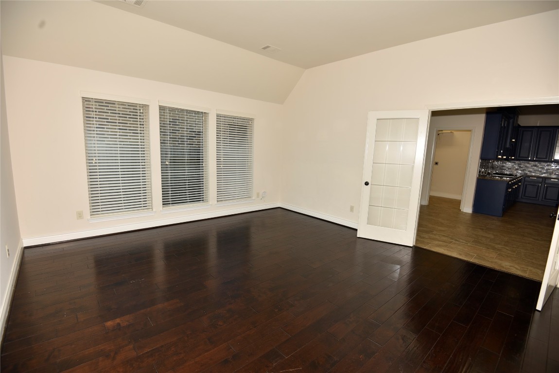 18610 Lena Trail Drive Spring, TX 77388 - Photo 32 of 47 wooden floor in an empty room with a window