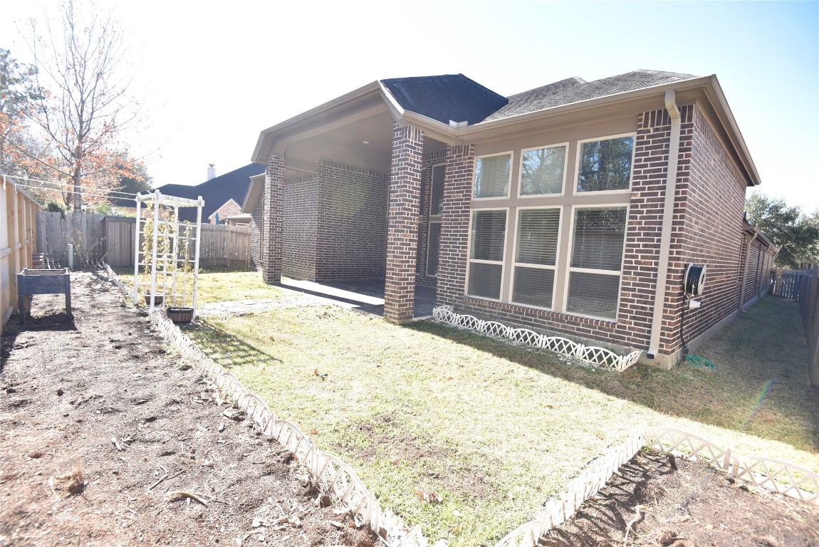 18610 Lena Trail Drive Spring, TX 77388 - Photo 47 of 47 a front view of a house with a yard