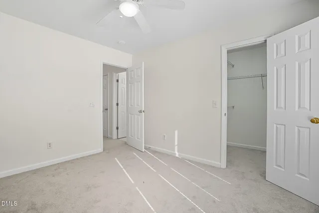 an empty room with a bathroom