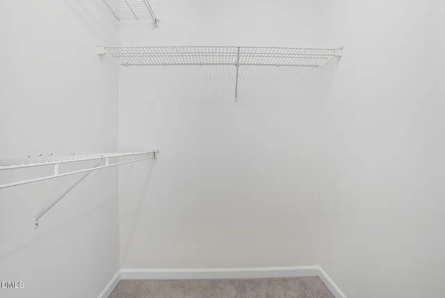a view of small space with racks on the wall