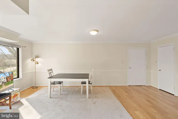 a room with furniture and a flat screen tv