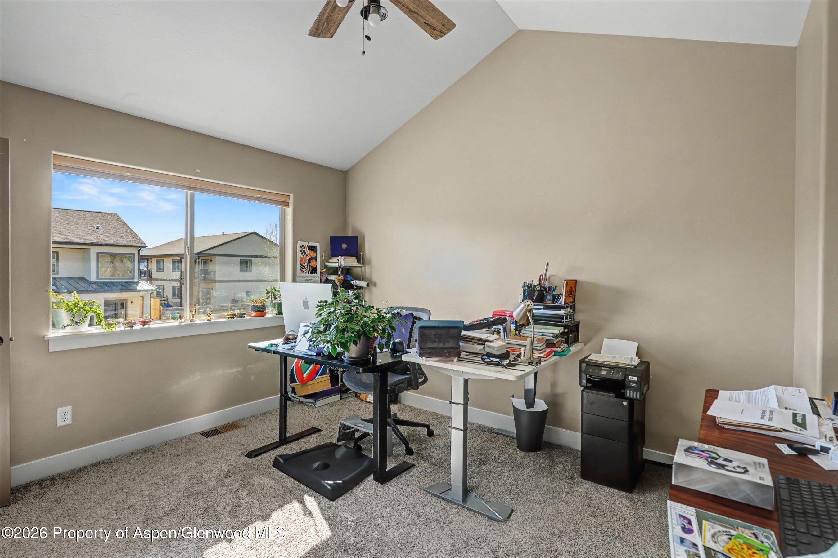 157 Willow Circle Rifle, CO 81650 - Photo 13 of 18 a room with furniture and a potted plant