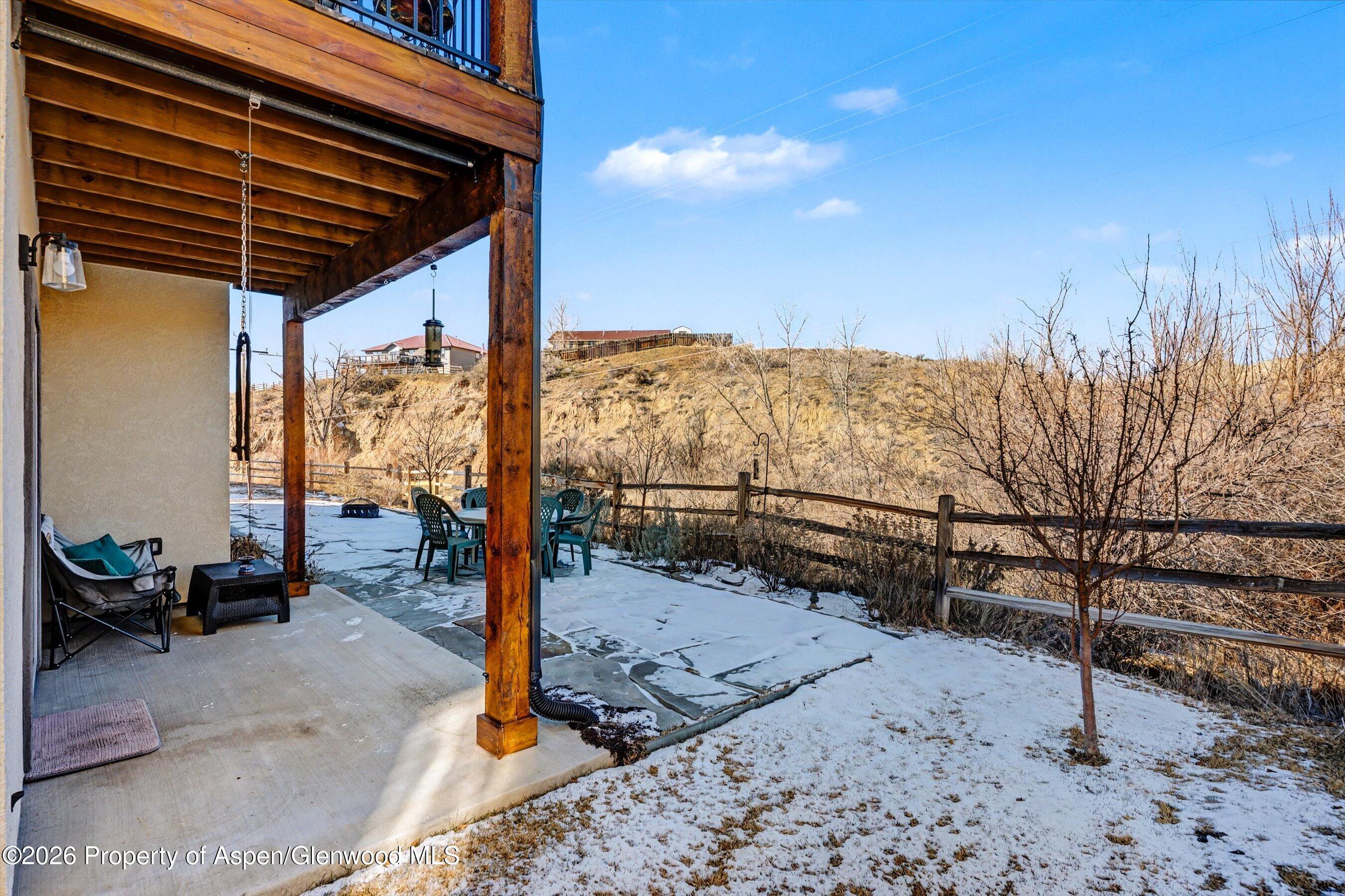 157 Willow Circle Rifle, CO 81650 - Photo 17 of 18 a view of a backyard with wooden fence