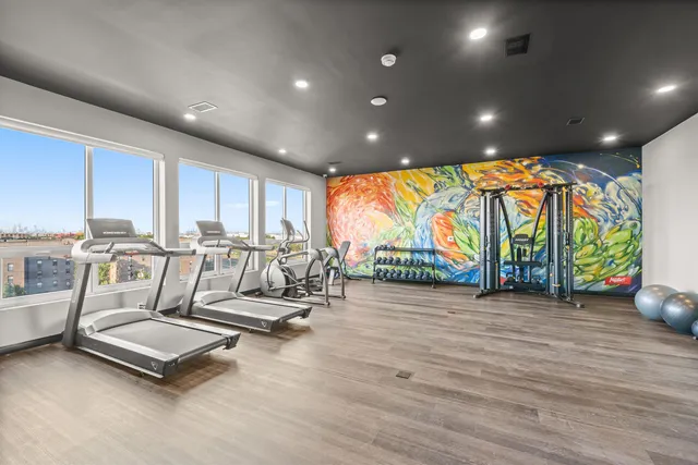 a view of a room with gym equipment