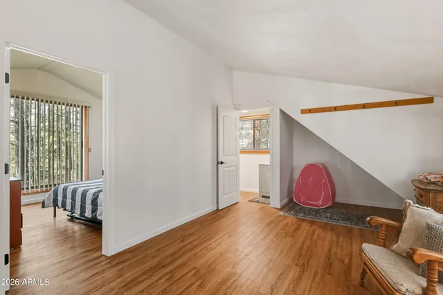 a view of livingroom with furniture and wooden floor