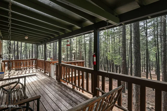 a view of a balcony with furniture