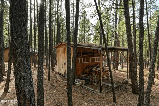 a view of balcony with furniture and trees