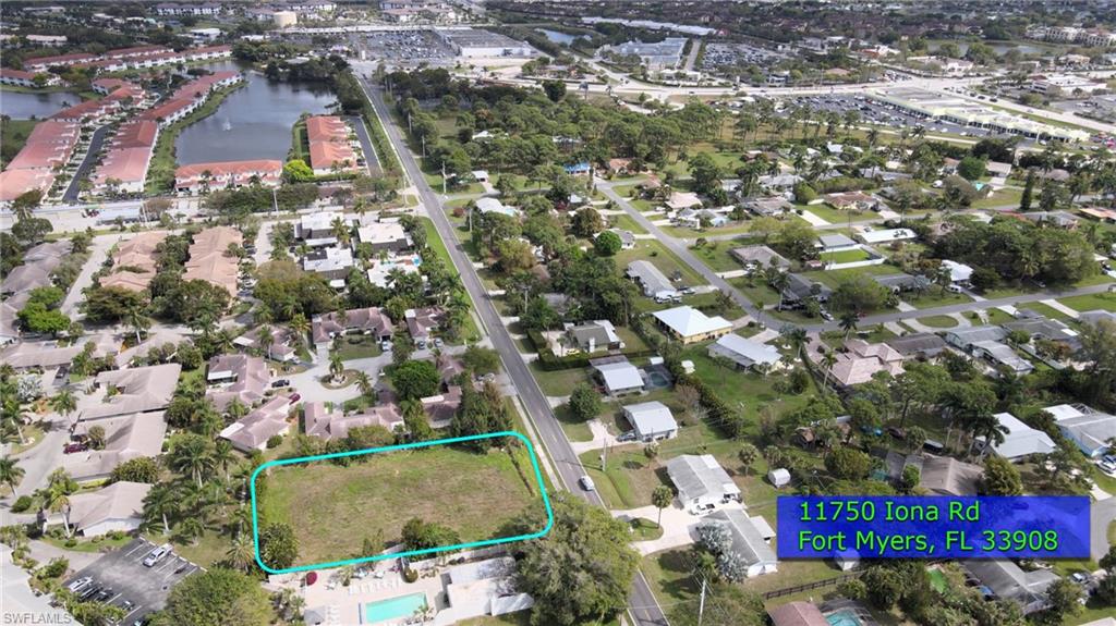 11750 Iona Road Fort Myers, FL 33908 - Photo 4 of 13 an aerial view of residential houses with outdoor space