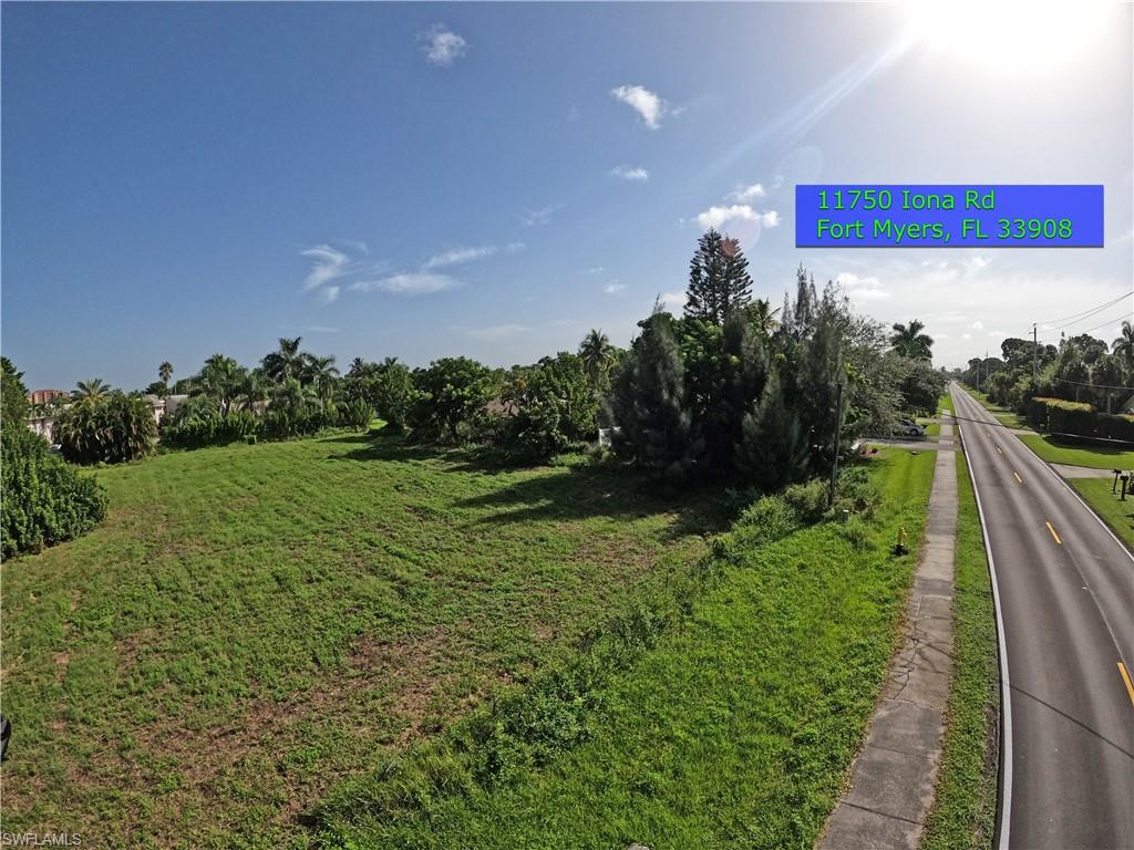 11750 Iona Road Fort Myers, FL 33908 - Photo 7 of 13 a view of a yard in front of a house