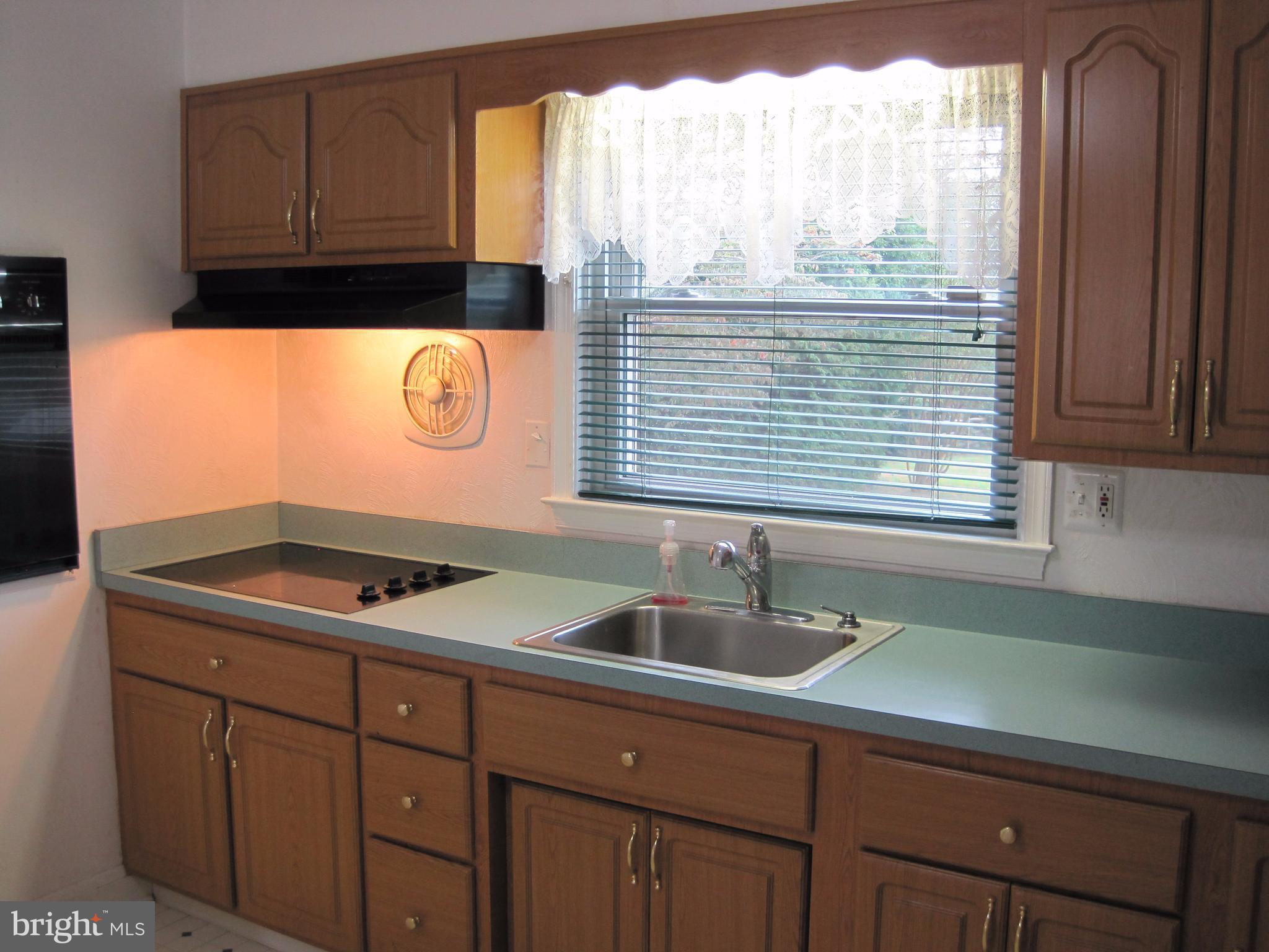 10012 Magledt Road Baltimore, MD 21234 - Photo 6 of 18 ATTRACTIVE CABINETRY & COUNTERTOPS!