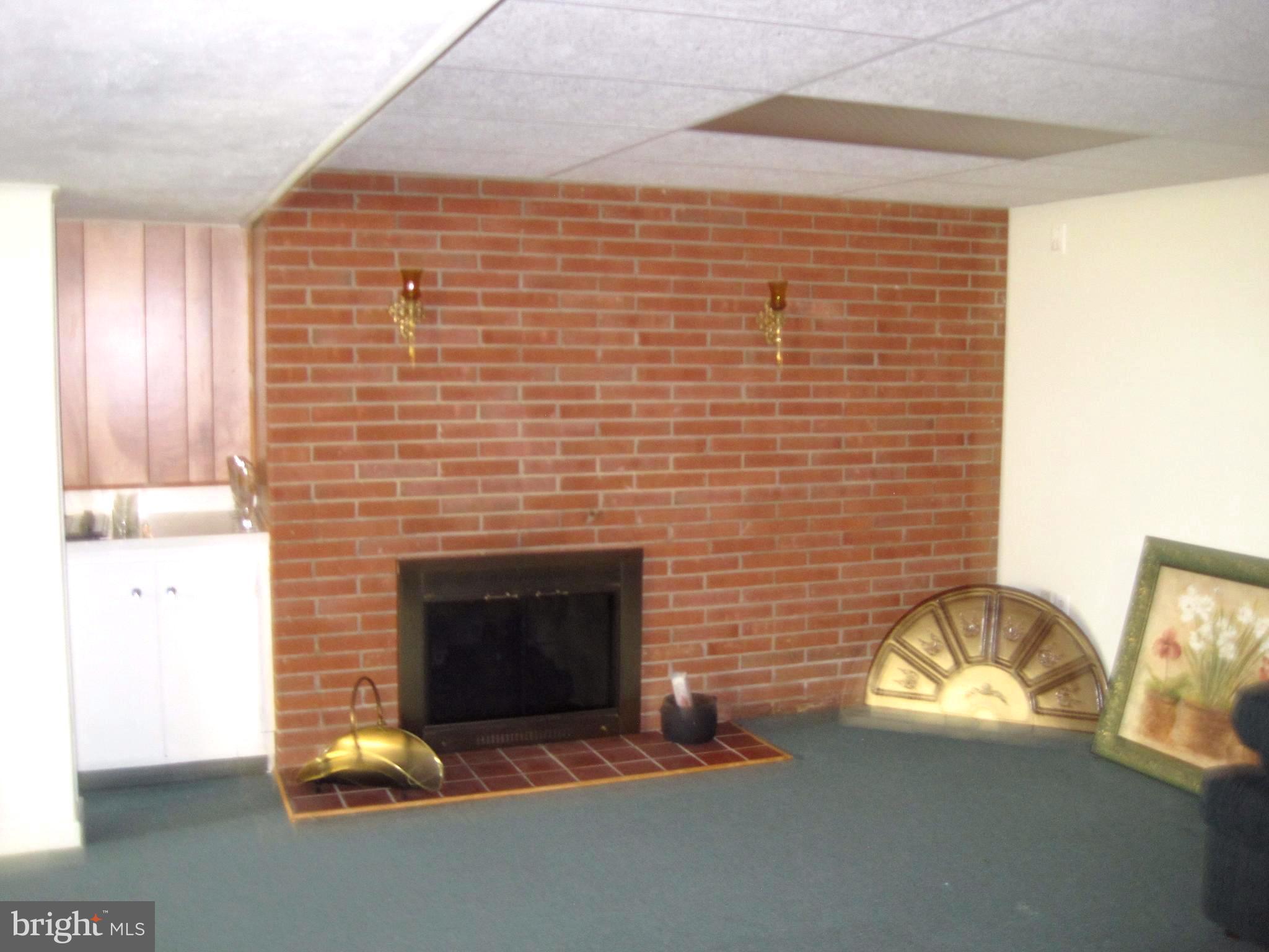 10012 Magledt Road Baltimore, MD 21234 - Photo 8 of 18 GAS LOG FIREPLACE IN FAMILY ROOM