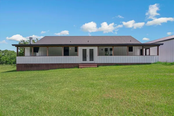 a house view with a garden space