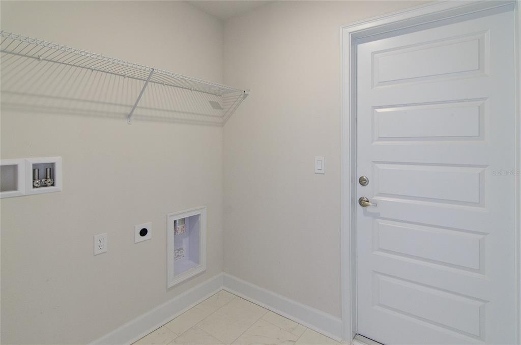 67 Sedgwick Trail Palm Coast, FL 32164 - Photo 13 of 27 a view of an empty walk in closet