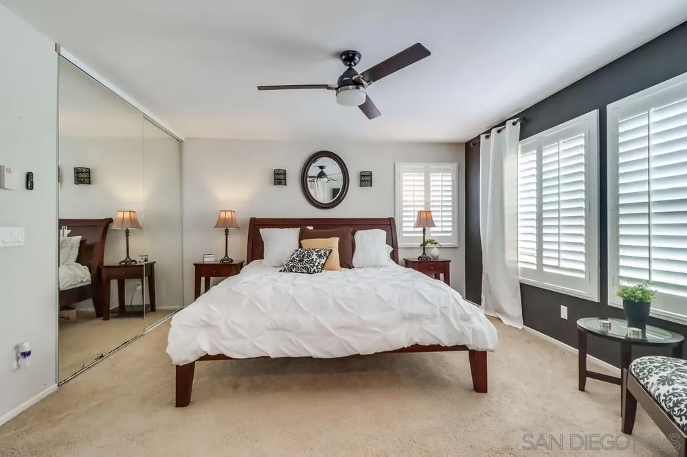 2567 View Trail Court Chula Vista, CA 91914 - Photo 24 of 55 a bedroom with a bed and a table in it