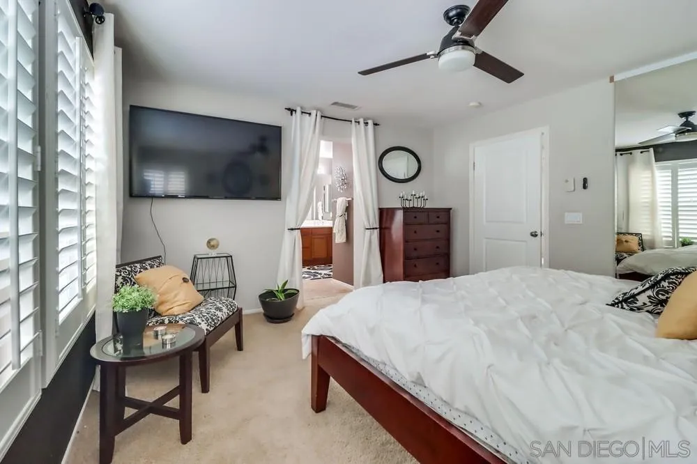 2567 View Trail Court Chula Vista, CA 91914 - Photo 25 of 55 a bedroom with a bed and furniture