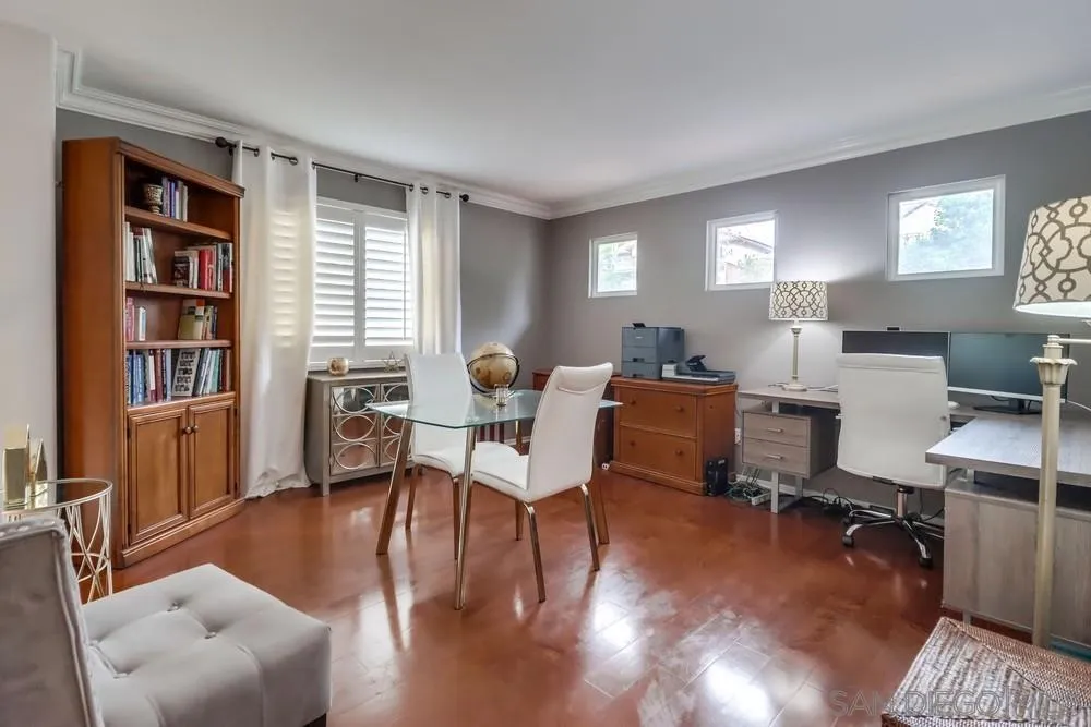 2567 View Trail Court Chula Vista, CA 91914 - Photo 35 of 55 a living room with furniture and a book shelf