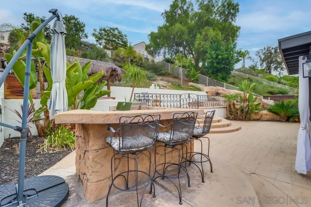 2567 View Trail Court Chula Vista, CA 91914 - Photo 43 of 55 a view of an outdoor space with a table and chairs